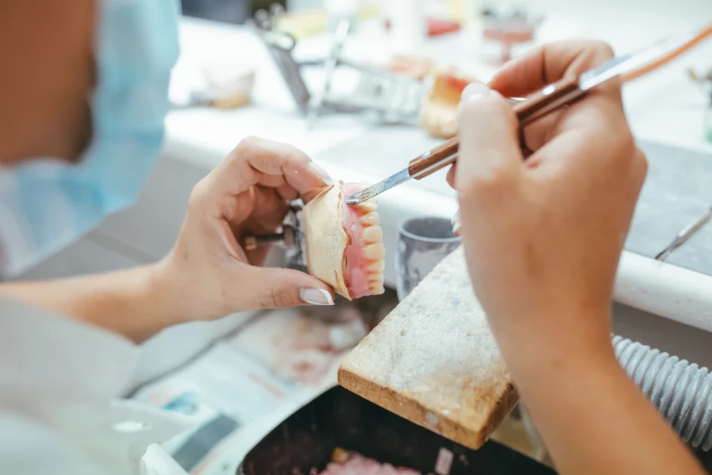 Complete dentures being made